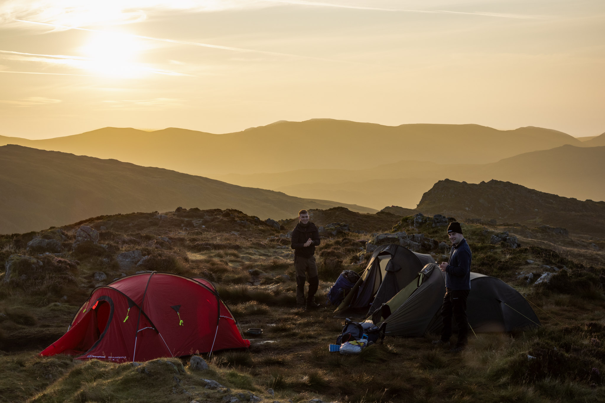 Mountain campsite glowing in evening light