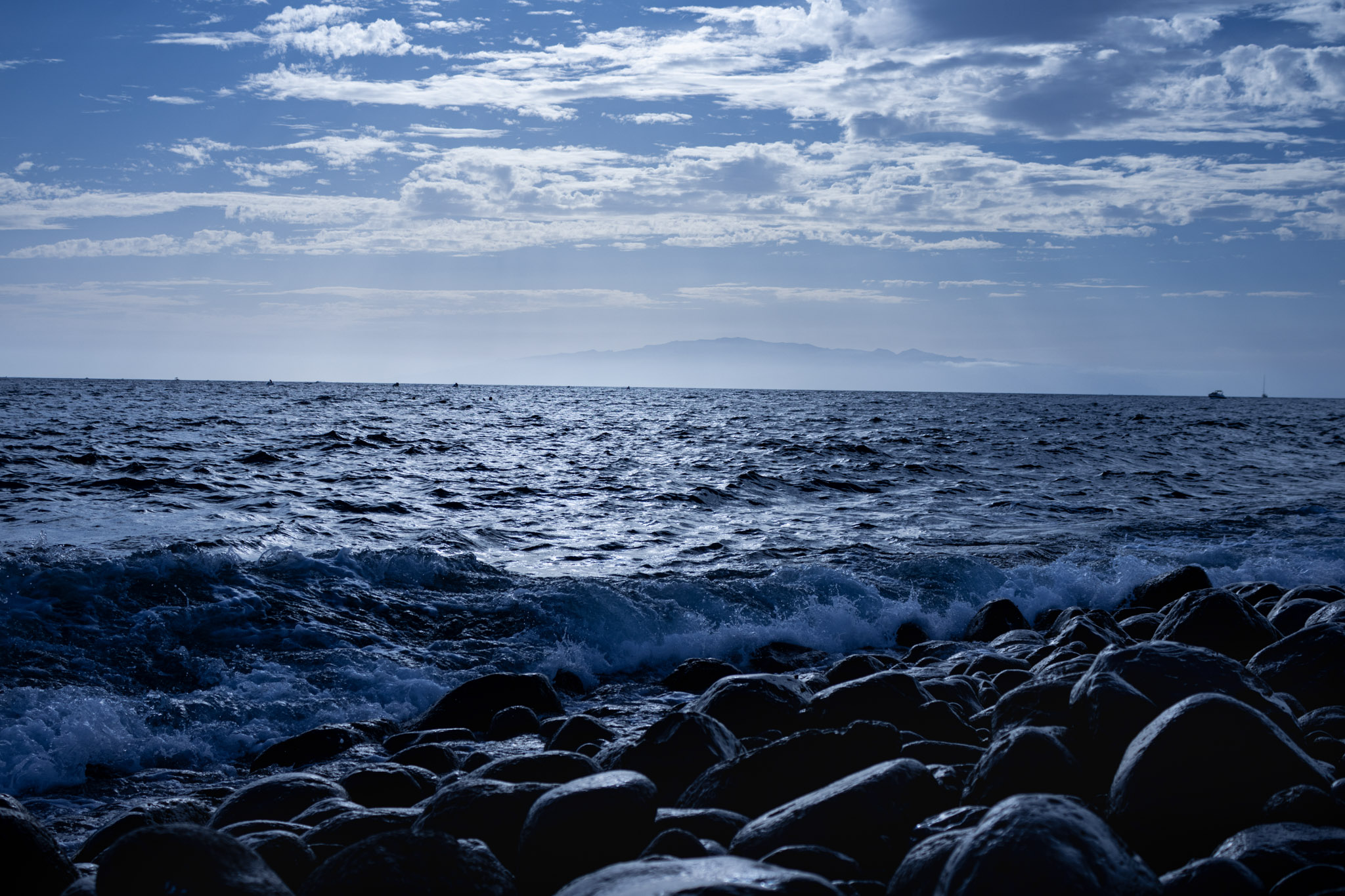 Waves breaking along a rocky coastline